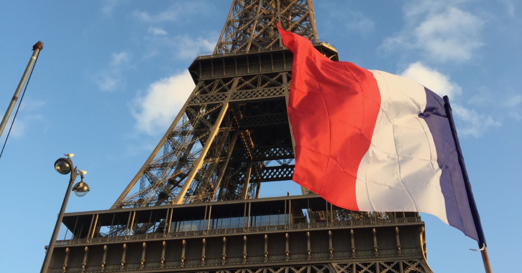 French flag against the Eiffel Tower